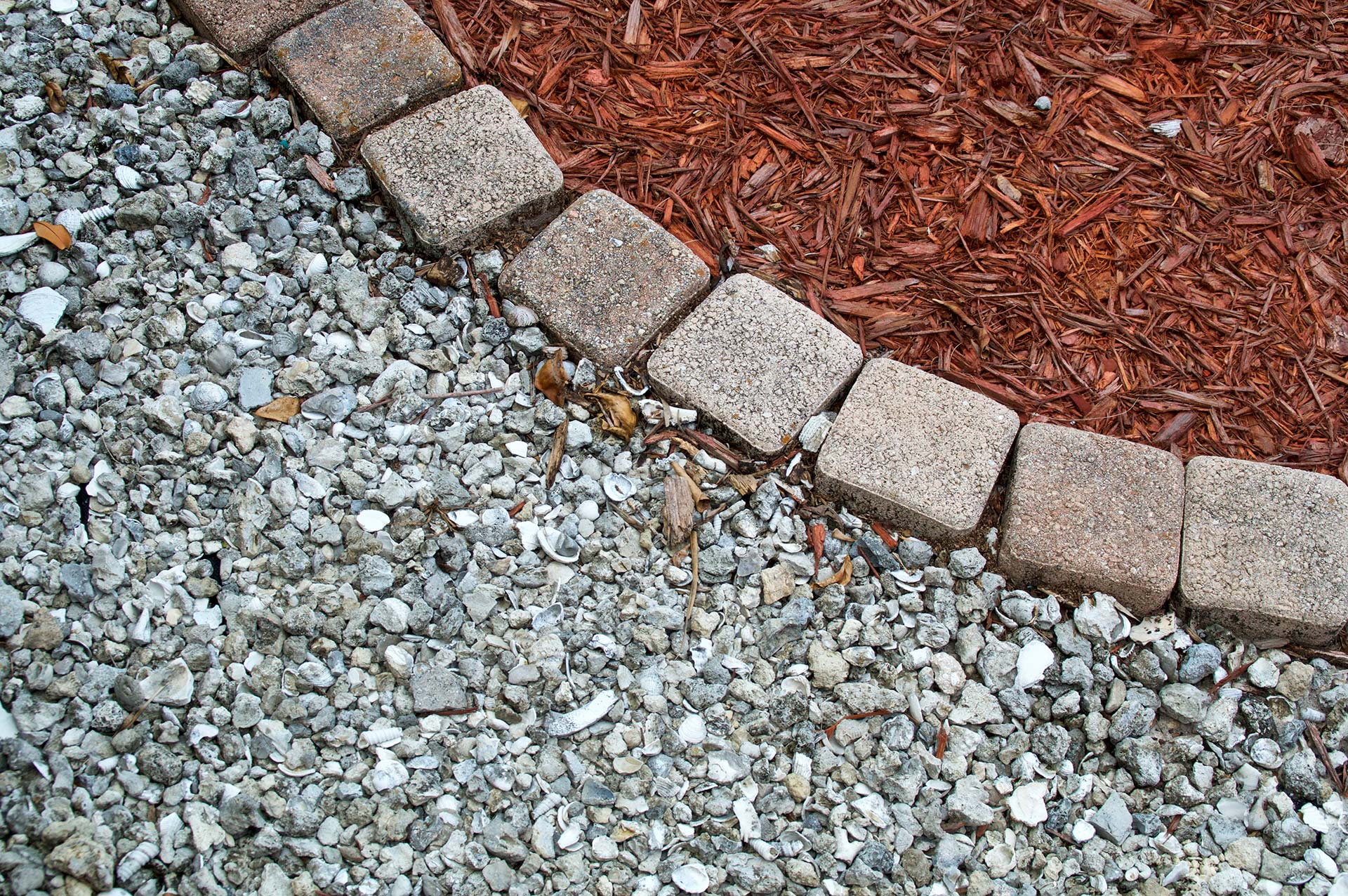 mulch gravel and brick background